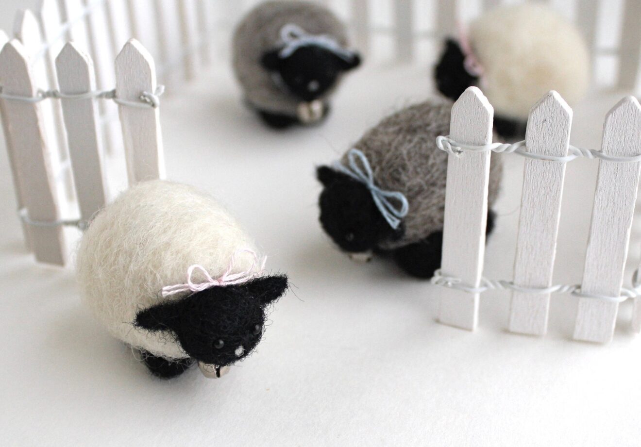 A hand-crafted group of sheeps.