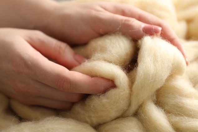 Hands on wool